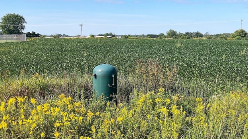 Abbotsford’s Municipal Wells #8, #9 & #15 are located adjacent to the agricultural field in the background. Trees and perennial grasses have been planted to improve groundwater recharge quality. Photo Credit: Josh Soyk-Abbotsford City Administrator.