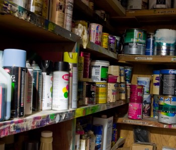 Collection of household products containing VOCs including paints, stains, and paint thinners. Photo: Tom Murphy VII