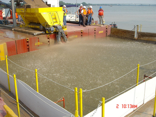 A sand spreader in action on the Fox River.