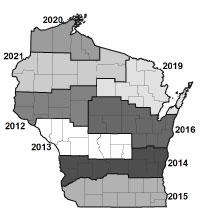 A map of Wisconsin, divided into sections based on the year in which aerial photos were taken.