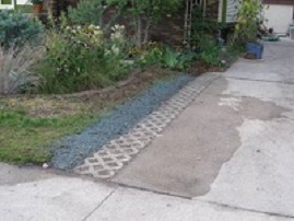 Pavers on edge of driveway